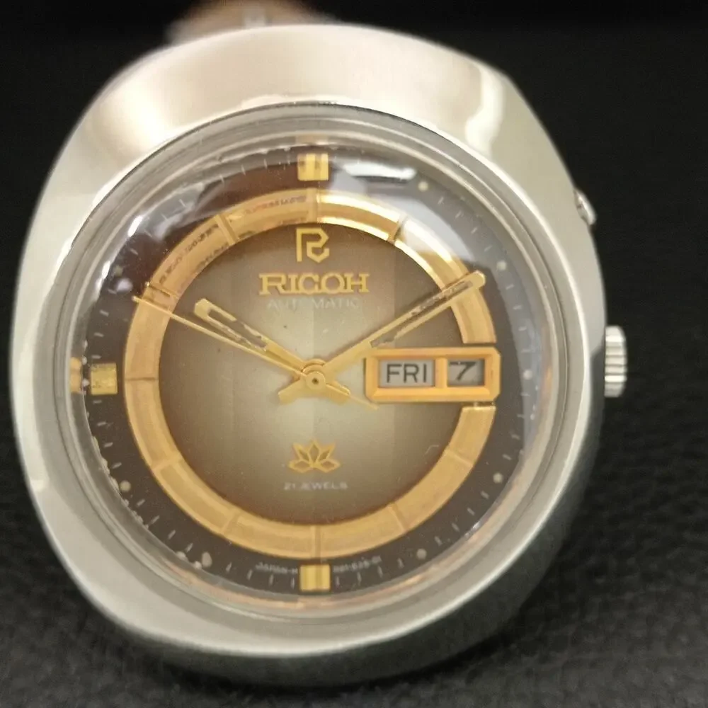 Vintage 1975 Ricoh Automatic Mens Silver Watch W/daydate & Gold accents